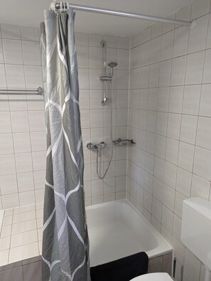 Hair dryer, towels, soap, shampoo