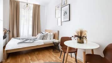 1 habitación, tabla de planchar con plancha, cuna de viaje y wifi