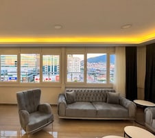 Deluxe Twin Room | Living area | Flat-screen TV