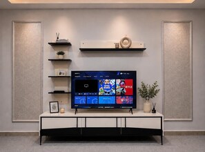 Deluxe-Zweibettzimmer | Wohnbereich | Flachbildfernseher