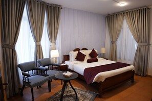 Deluxe-Zimmer | 3 Schlafzimmer, schallisolierte Zimmer, Bügeleisen/Bügelbrett