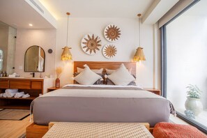 The bedroom features an ensuite bathroom and ample closet - Romantic Zone Gem @ Nomada | Walk to Beach (Puerto Vallarta)