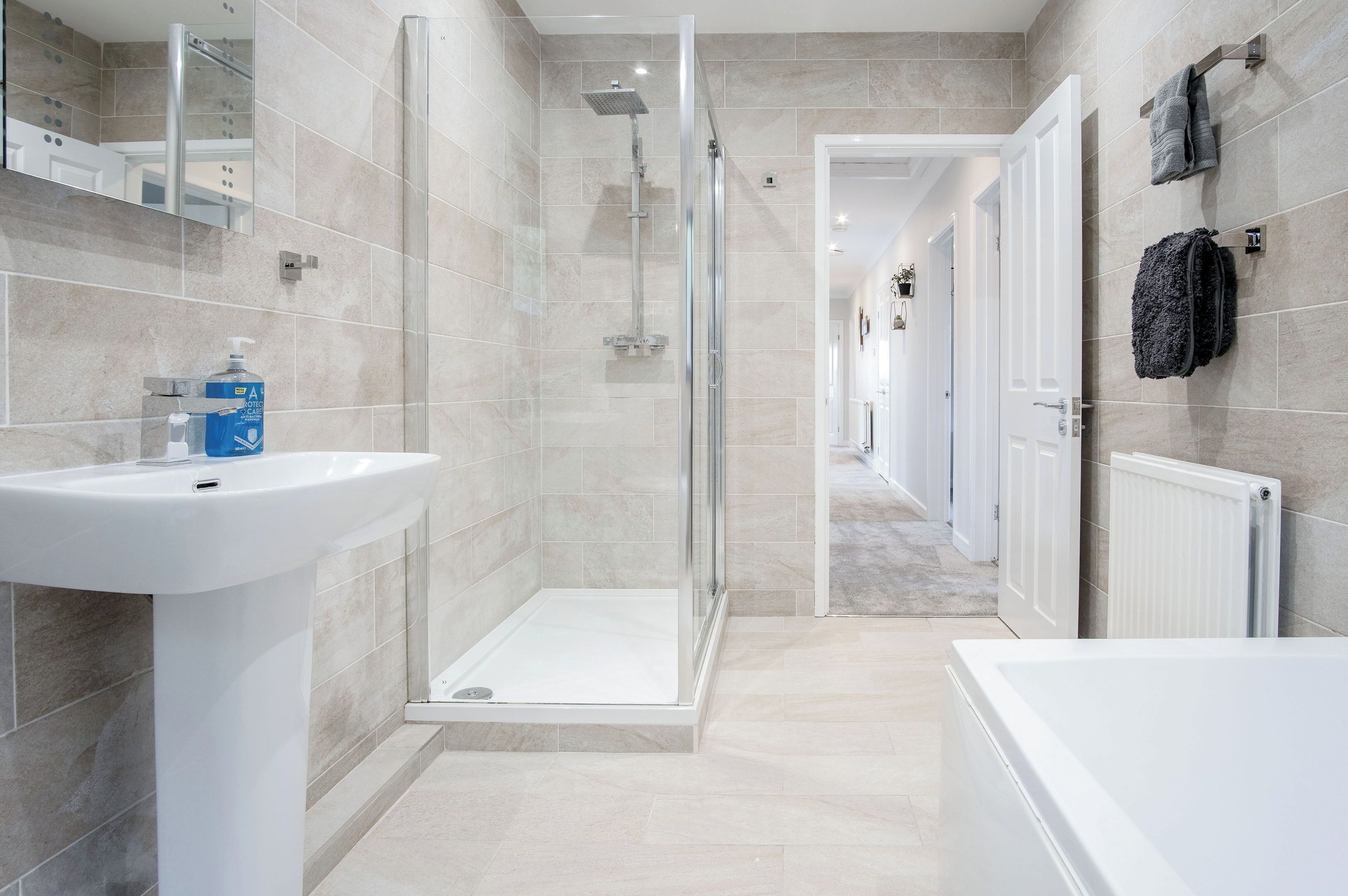 Shower, hair dryer, towels