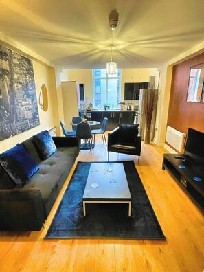Standard Apartment | Living area | 40-inch LCD TV with cable channels - Centrally Located Loft Apartment (Sheffield)