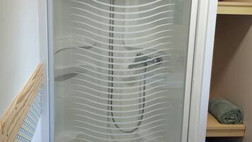 Shower, hair dryer, bathrobes, towels