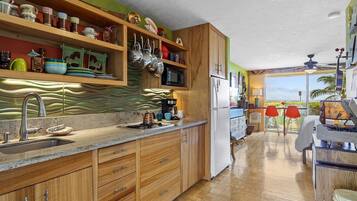 Condo, 1 Queen Bed, Lanai, Ocean View | Private kitchen | Fridge, microwave, stovetop, coffee/tea maker
