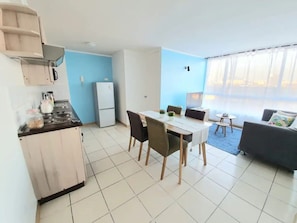 Apartment | Private kitchen | Full-size fridge, microwave, oven, toaster - Cnel. Souper 4060 (Santiago)