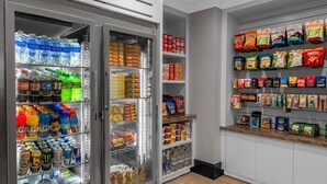 A well-stocked mini-grocery section with various beverages, snacks, and packaged goods. - Dream Las Vegas Retreat Steps from the Strip! (Las Vegas)