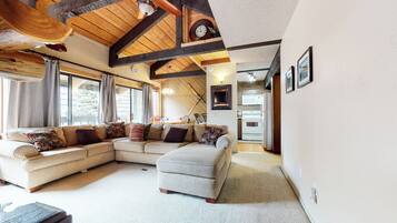 Condo, Multiple Beds, Hot Tub | Living area | TV, fireplace