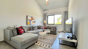 Smart TV, fireplace, foosball, books