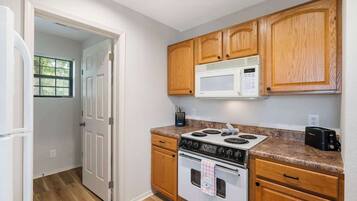 Condo, Multiple Beds, Patio, Garden View (Branson Cozy Bungalow) | Private kitchen | Coffee/tea maker