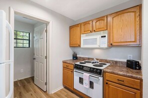 Condo, Multiple Beds, Patio, Garden View (Branson Cozy Bungalow) | Private kitchen | Coffee/tea maker