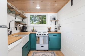 Cabin, 1 King Bed with Sofa bed, Patio, Mountain View (Cedar Creek) | Private kitchen | Coffee/tea maker