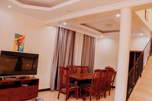 Business Room | Living area | Fireplace, heated floors - Reflection hotel (Kigali)