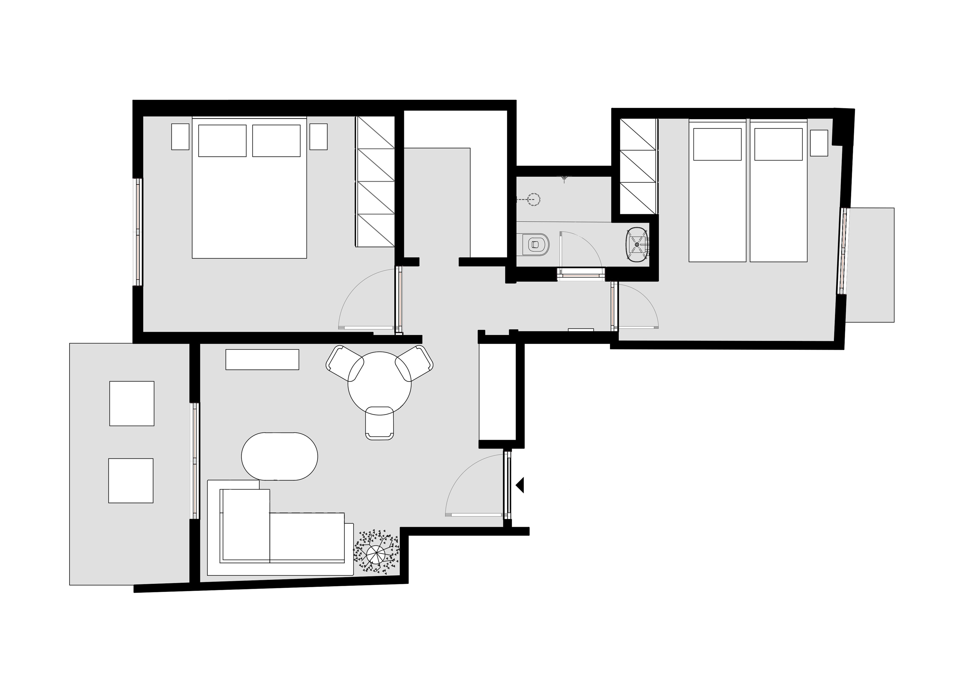 A floor plan of a hotel with multiple rooms, a central living area with a sofa and coffee table, and a separate dining area.