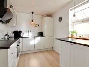 Fridge, oven, highchair, cookware/dishes/utensils