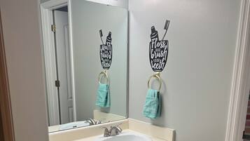 Hair dryer, towels, soap, shampoo