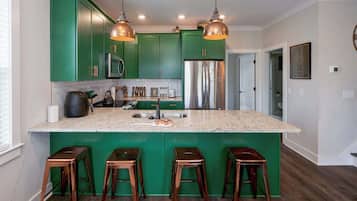 Townhome, Multiple Beds, Balcony | Private kitchen | Fridge, microwave, oven, stovetop