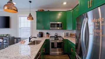 Townhome, Multiple Beds, Balcony | Private kitchen | Fridge, microwave, oven, stovetop