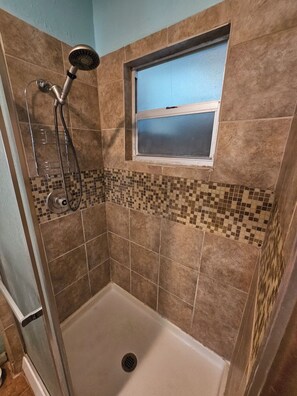 Hair dryer, towels, soap, toilet paper