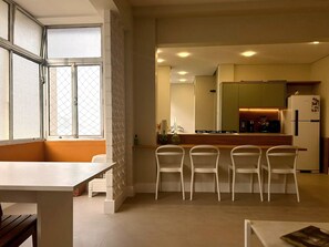 Dining - Renovated beach view condo within walking distance from the mall. (Aparecida Santos)