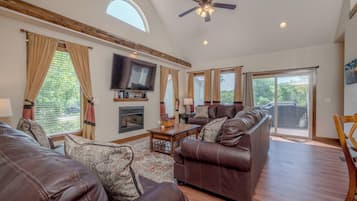 House, Multiple Beds, Patio, Garden View (Hickory Hideaway) | Living area | 42-inch flat-screen TV with digital channels, fireplace