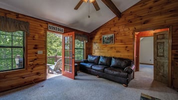 Cabin, Multiple Beds, Hot Tub, Garden View | Living area | TV, fireplace