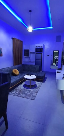 Deluxe Apartment, 1 Bedroom | Living area | 48-inch LED TV with satellite channels, Netflix, streaming services