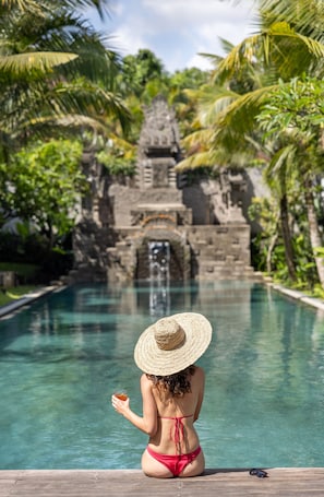 Outdoor pool. The Hava Ubud A Pramana Experience