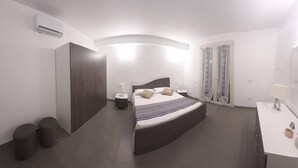 2 dormitorios, tabla de planchar con plancha, Internet y ropa de cama
