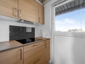 Fridge, microwave, dishwasher, cookware/dishes/utensils
