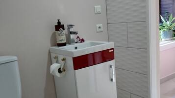 Hair dryer, towels, soap, shampoo