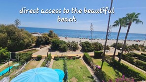 On the beach, sun loungers, beach towels - Barbara's Beach House, direct waterfront Playa Paraíso Manilva Andalusia (Manilva)