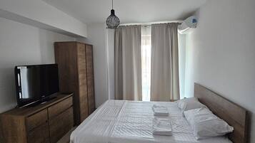 1 habitación, tabla de planchar con plancha, wifi y ropa de cama