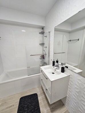 Hair dryer, towels, soap, shampoo