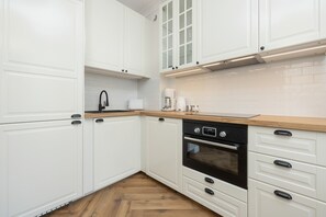 Enjoy cooking in this well-equipped kitchen with an oven and coffee maker.