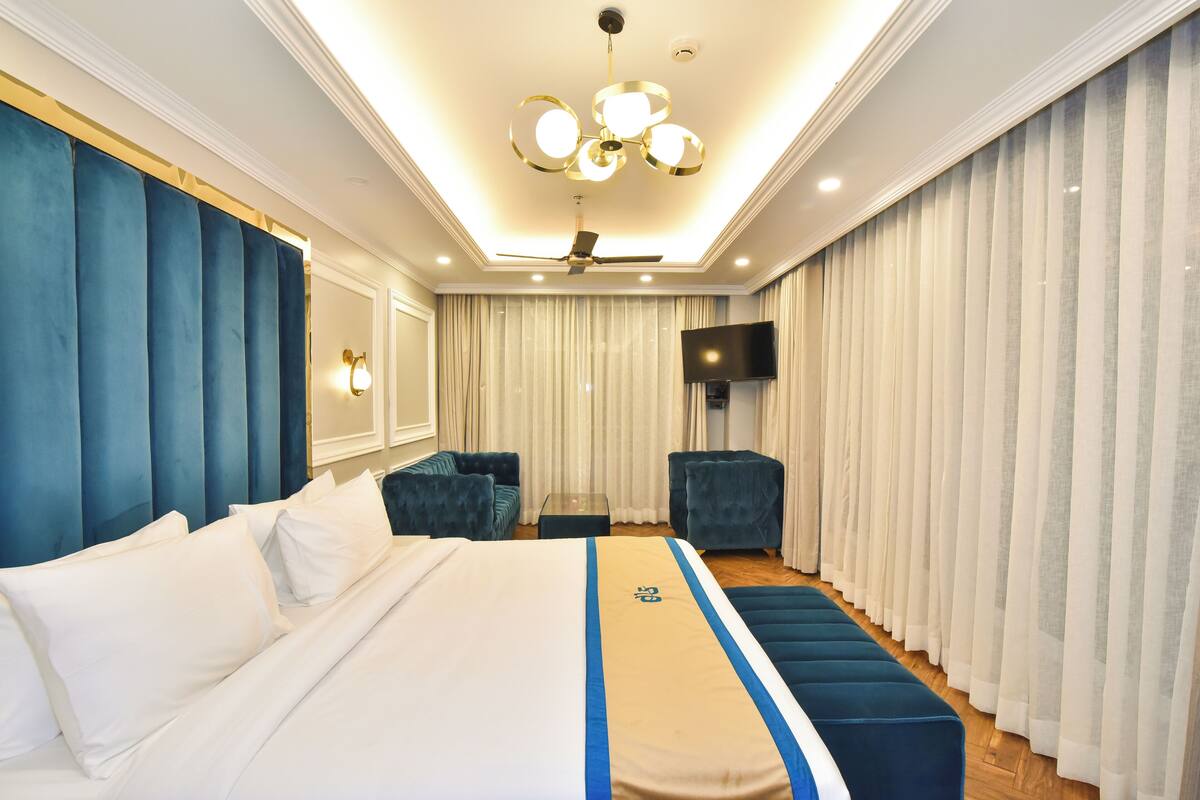 Quarto luxo | 1 quarto, ferros/tábuas de passar roupa, Wi-Fi de cortesia