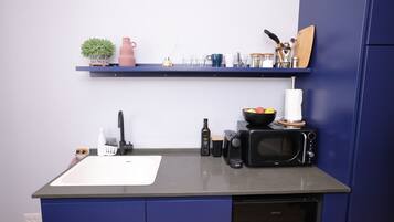 Microwave, stovetop, dining tables