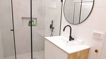 Shower, towels, soap, shampoo