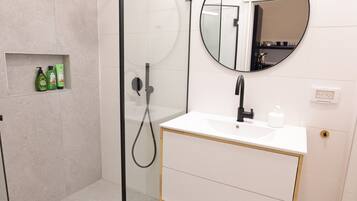 Shower, towels, soap, shampoo