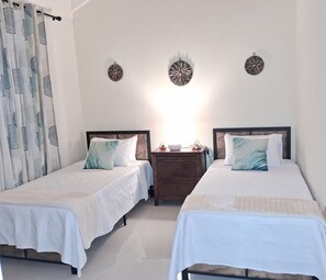 2 bedrooms, desk, iron/ironing board, travel crib