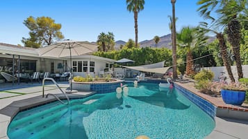 Outdoor pool, pool umbrellas, pool loungers