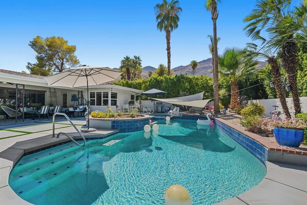 Outdoor pool, pool umbrellas, pool loungers