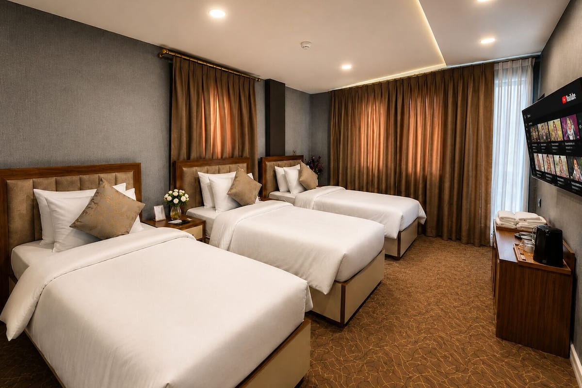 Family Suite, Balcony | Minibar, in-room safe, desk, laptop workspace