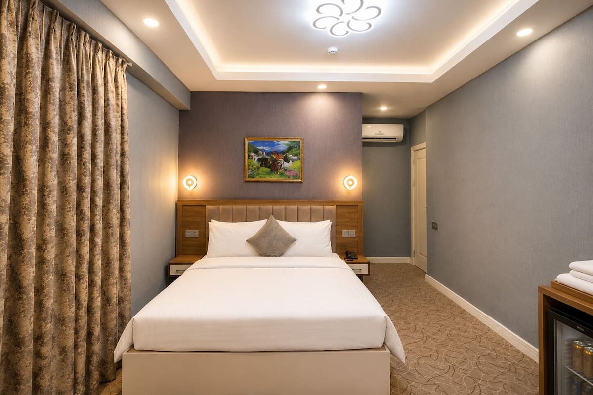 Superior Double Room | Minibar, in-room safe, desk, laptop workspace