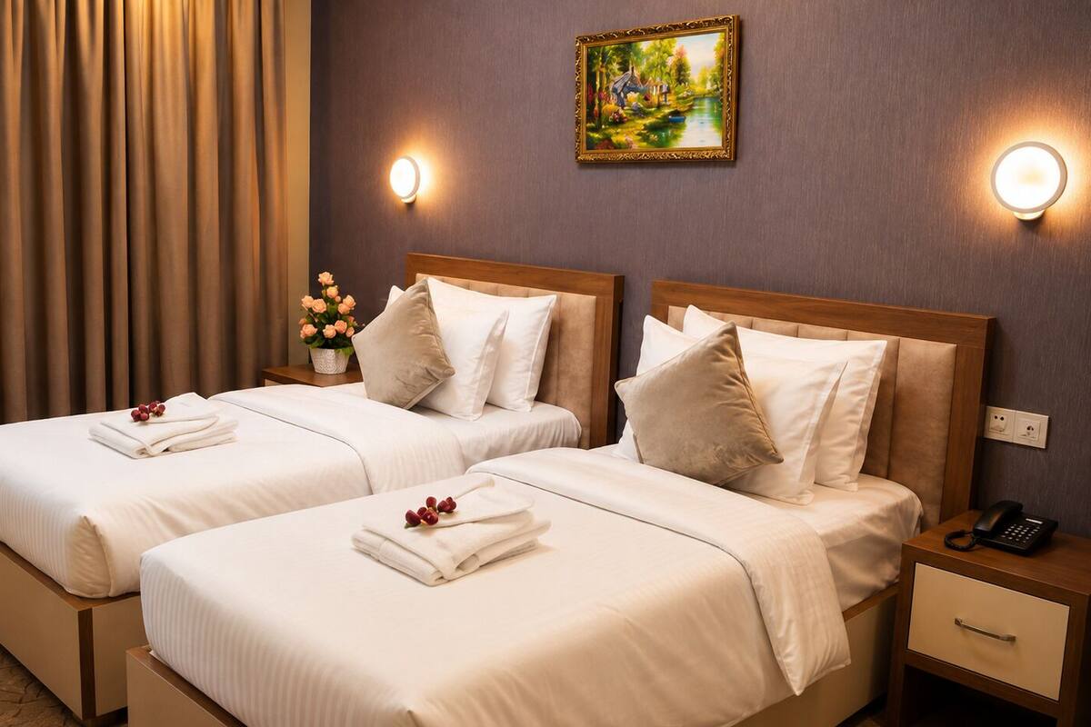 Standard Twin Room | Minibar, in-room safe, desk, laptop workspace