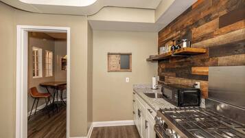 Condo, Multiple Beds | Private kitchen | Fridge, microwave, oven, stovetop