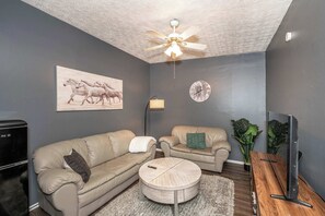 Condo, Multiple Beds | Living area | TV