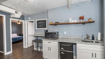 Condo, Multiple Beds | Private kitchen | Fridge, microwave, oven, dishwasher
