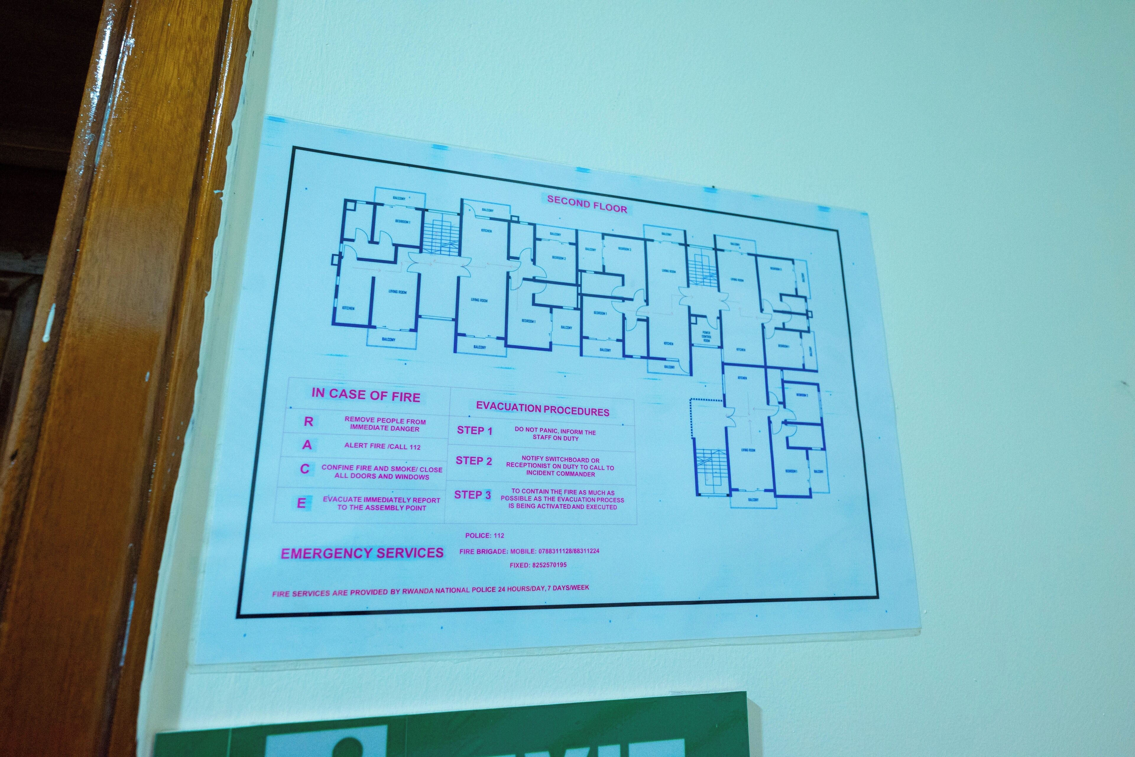 A floor plan with emergency procedures and evacuation steps.